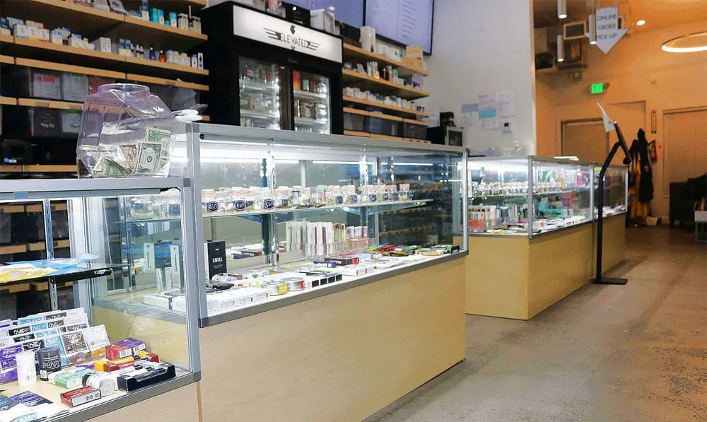 Glass display cases along the counter at Elevated San Francisco